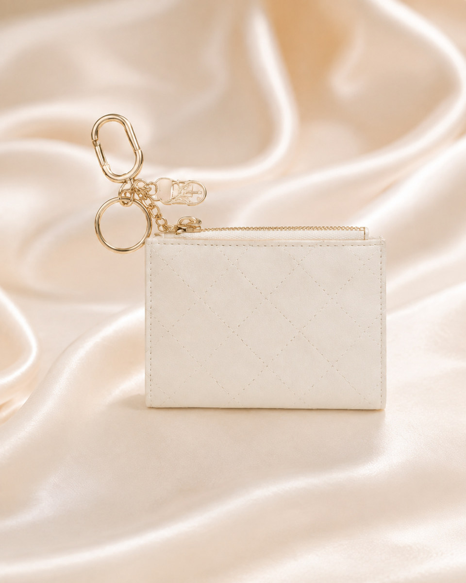 Victoria’s Secret Tarjetero acolchado color crema